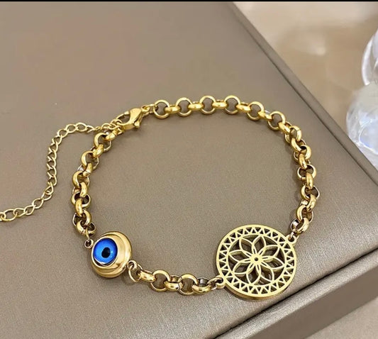 Pulsera Dorada en Acero Inoxidable – Ojo Turco & Flor de la Vida