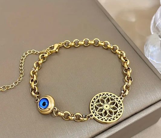 Pulsera Dorada en Acero Inoxidable – Ojo Turco & Flor de la Vida